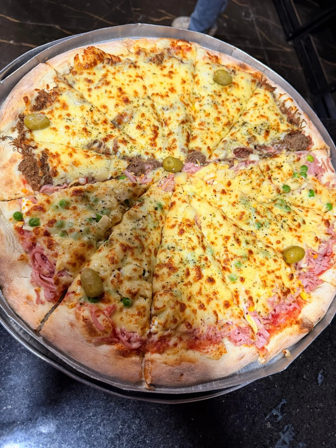 Pizza da Planeta Pizza com vários sabores