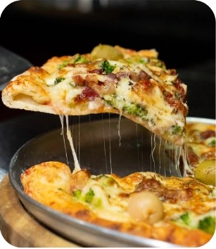 Pizza servida na Planeta Pizza